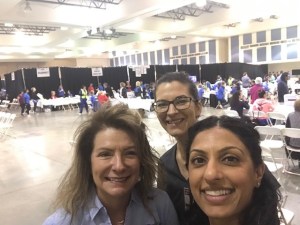Team smiling during community outreach
